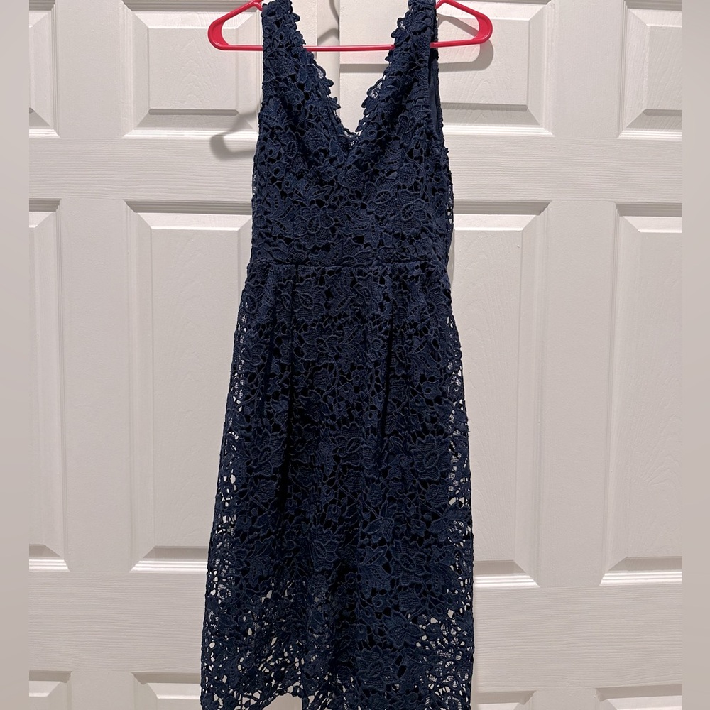 Navy dress with lace overlay